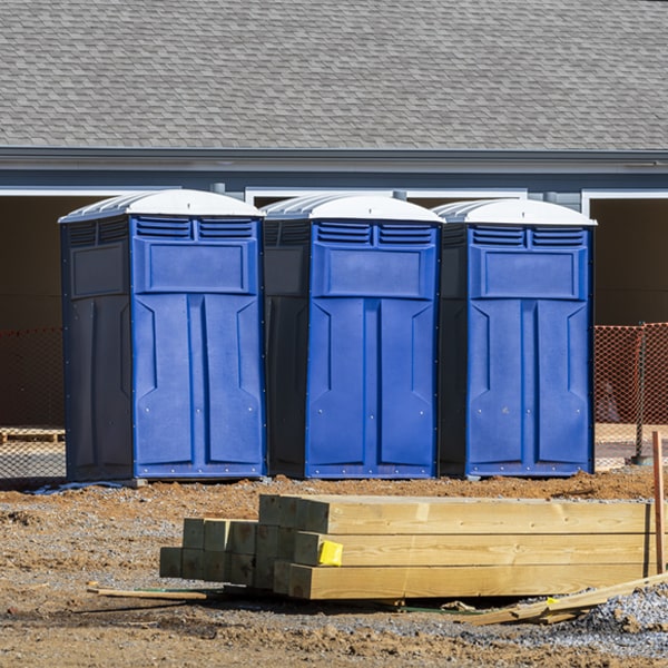 how often are the portable restrooms cleaned and serviced during a rental period in Sayville